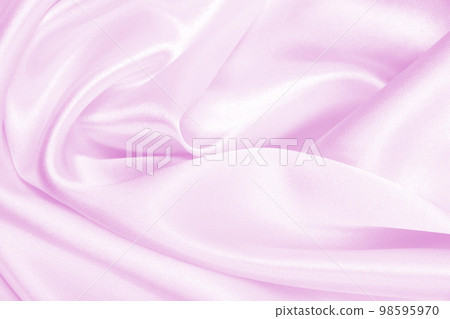 Smooth elegant pink silk or satin texture as wedding background. Luxurious background design Smooth elegant pink silk or satin texture as wedding background. Luxurious background design 98595970