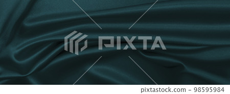 Smooth elegant blue silk or satin luxury cloth texture as abstract background. Luxurious Christmas background or New Year background design Smooth elegant blue silk or satin luxury cloth texture as abstract background. Luxurious Christmas background or New Year background design 98595984
