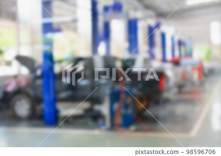 car repair service center blurred background 98596706