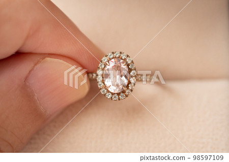 hand hold beautiful jewelry diamond ring hand hold beautiful jewelry diamond ring 98597109