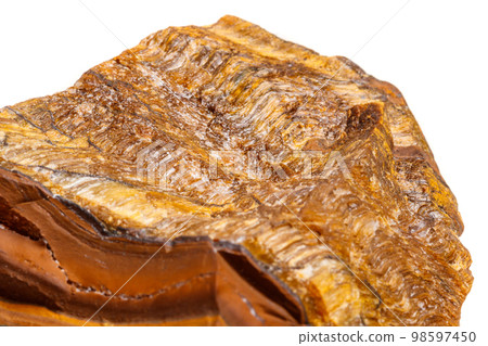 Macro mineral stone Tiger's eye in the breed on a white background 98597450