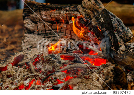 texture flame from burning logs at night 98597473