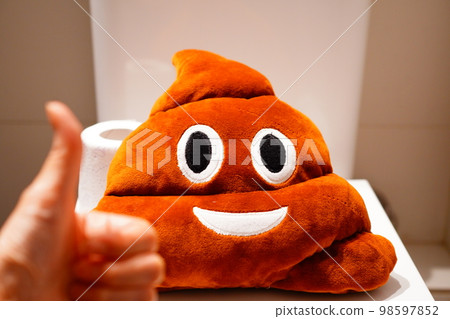 An image of defecation A toy with a poop design in the toilet An image of defecation A toy with a poop design in the toilet 98597852