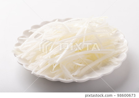 A gray green onion A gray green onion 98600673