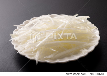 A gray green onion A gray green onion 98600681