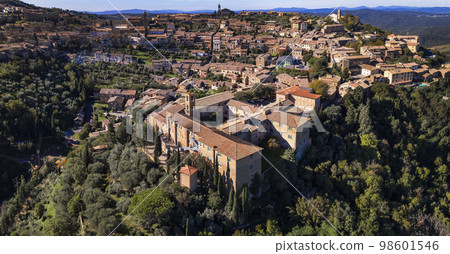 Italy travel and landmarks. Tuscany region, aerial panoramic view of old town Montalcino 98601546