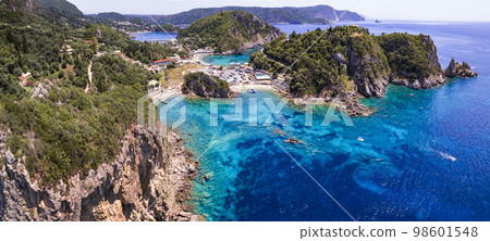Corfu island. aerial drone view of  most popular and beautiful Paleokastrtsa tourist village and resort, Ampelaki Beach. Greece, ionian islands 98601548