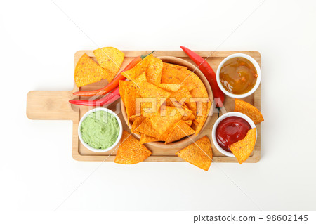 Concept of tasty snacks, corn chips, isolated on white background Concept of tasty snacks, corn chips, isolated on white background 98602145