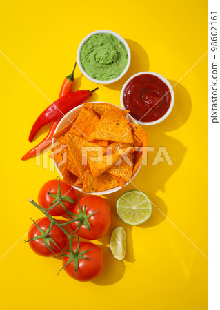 Concept of tasty snacks, corn chips, top view 98602161