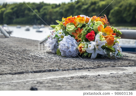 Artificial flowers at Ballina harbour in County Mayo - Ireland Artificial flowers at Ballina harbour in County Mayo - Ireland 98603136