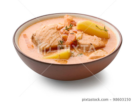 bowl of salmon and tomato soup 98603150