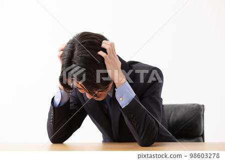 Man worried suit 98603278