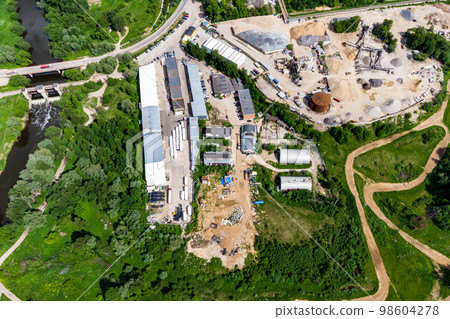 Aerial view of the industrial area with hangars outside the city 98604278