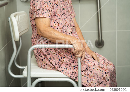 Asian senior or elderly old lady woman patient use toilet bathroom handle security in nursing hospital ward, healthy strong medical concept. 98604991