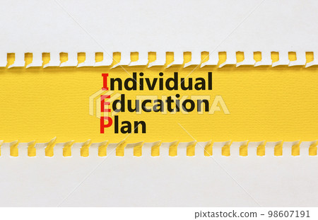 IEP individual education plan symbol. Concept words IEP individual education plan on white paper on a beautiful yellow background. Business IEP individual education plan concept. Copy space. IEP individual education plan symbol. Concept words IEP individual education plan on white paper on a beautiful yellow background. Business IEP individual education plan concept. Copy space. 98607191