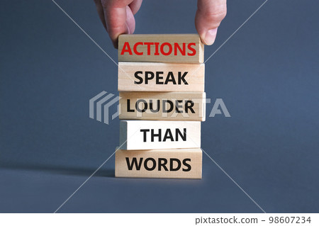 Actions speak louder words symbol. Concept words Actions speak louder than words on wooden blocks. Beautiful grey table grey background. Business new mindset for results concept. Copy space. 98607234