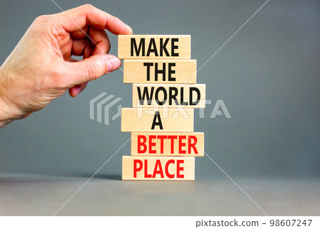 Make a better world symbol. Concept words Make the world a better place on wooden blocks. Beautiful grey table grey background. Businessman hand. Business make a better world concept. Copy space. Make a better world symbol. Concept words Make the world a better place on wooden blocks. Beautiful grey table grey background. Businessman hand. Business make a better world concept. Copy space. 98607247