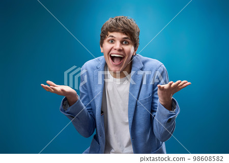 shocked man with surprise expression and excited face shocked man with surprise expression and excited face 98608582