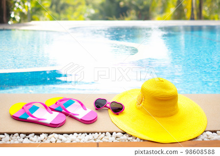 Pool and beach items flat lay. Summer vacation. Pool and beach items flat lay. Summer vacation. 98608588