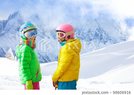Kids ski. Winter family snow sport. Child skiing Kids ski. Winter family snow sport. Child skiing 98608916