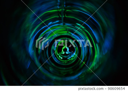 Yoga meditation in lotus pose with aura spiritual. Abstract blurred background Yoga meditation in lotus pose with aura spiritual. Abstract blurred background 98609654