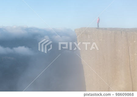 Cliff Preikestolen at fjord Lysefjord, Norway Cliff Preikestolen at fjord Lysefjord, Norway 98609868