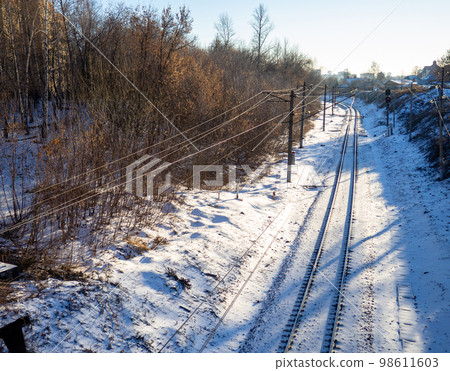 Railroad tracks in the snow.  Railway in winter 98611603