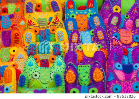 close-up many brooches animal head, sewn by hand, bright, colored, 98612826