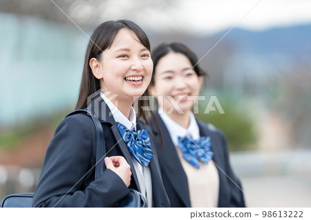 High school girl attending school uniform 98613222
