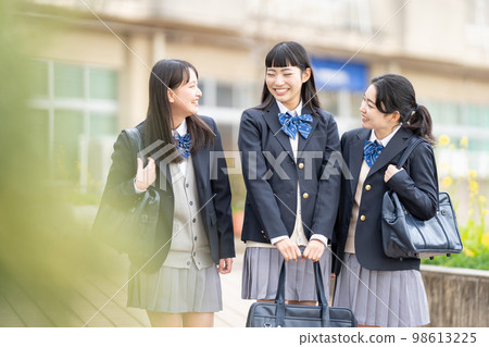High school girl attending school uniform 98613225