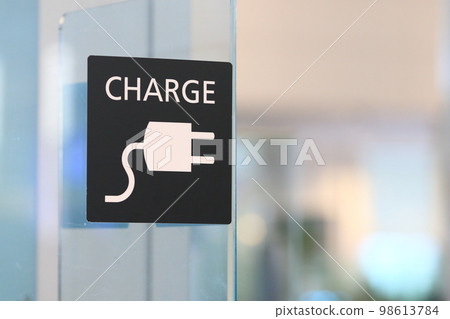 AC power supply, charging spot, airport lobby charging spot, outlet display 98613784