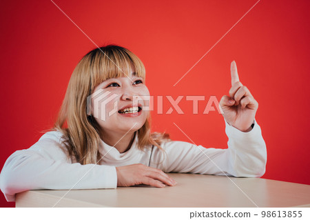 woman thinking of something woman thinking of something 98613855