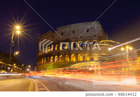 rome, italy, colosseum old ancient building gladiator battle at night. 98614412