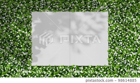 A background of a flowering garden and a white notebook with refreshing leaf silhouettes A background of a flowering garden and a white notebook with refreshing leaf silhouettes 98614885