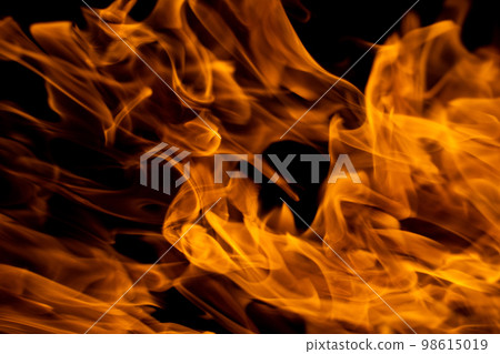 close up photo of fire flame on black background 98615019