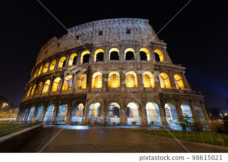 rome, italy, colosseum old ancient building gladiator battle at night. 98615021
