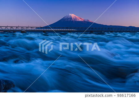 Crimson Mt.Fuji and torrent from the riverbed of Fujikawa River Crimson Mt.Fuji and torrent from the riverbed of Fujikawa River 98617166