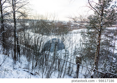 Military warehouse hangar located on a territory closed by a fence 98617186