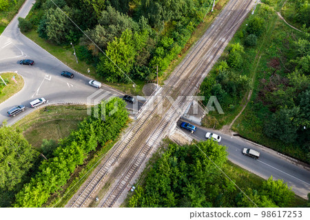 An aerial view of a road tunnel under the railroad through which cars drive. Southern tunnel in the city of Obninsk, Russia An aerial view of a road tunnel under the railroad through which cars drive. Southern tunnel in the city of Obninsk, Russia 98617253