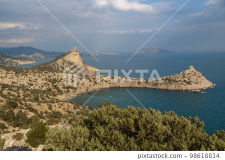 Top view of Cape Kapchik, Blue Bay and Mount Koba-Kaya. Crimea 98618814