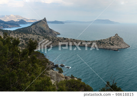 Top view of Cape Kapchik, Blue Bay and Mount Koba-Kaya. Crimea 98618815
