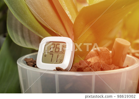 maintaining the temperature and humidity of the air necessary for indoor plants  98619302