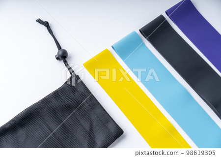 A set of colorful elastic fitness land. Expanders for women A set of colorful elastic fitness land. Expanders for women 98619305