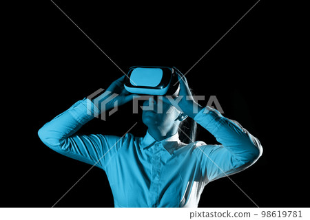Woman Wearing Vr Glasses And Looking On Important Messages. Businesswoman Having Virtual Reality Eyeglasses And Showing Crutial Informations. 98619781