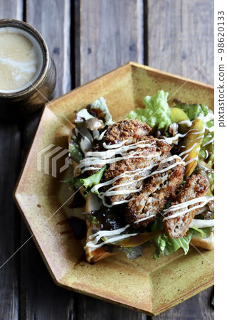 Minced meat cutlet and vegetable open sandwich with coffee and bread topping Minced meat cutlet and vegetable open sandwich with coffee and bread topping 98620133