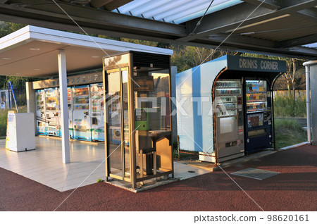public phone booth at dusk 98620161