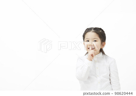 child girl on white background posing secretly 98620444