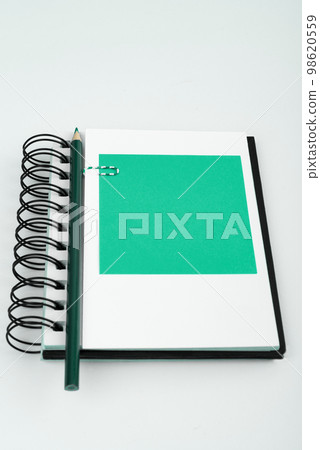 Multiple Assorted Collection Office Stationery Photo With Pens Pencils Notepads Notebook Ruler Stapler Scissors Clippers Paper Clips Holders Clipboard Placed Over Table. 98620559