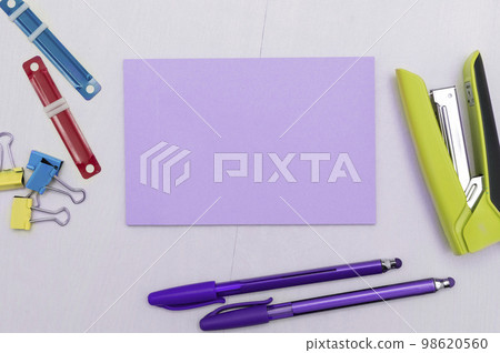 Different Office Supplies, Colored Stickers, Notebooks. Pens, Pencils, Rullers, Marckers. Different School Items. Important information. Accessories lying on desk. 98620560