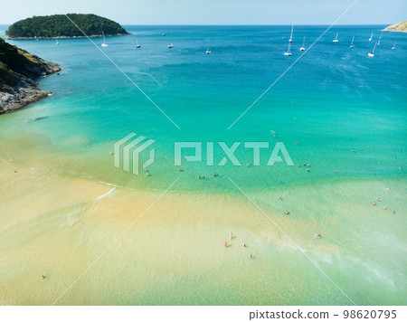 Wide angle view Nai Harn beach at phuket island on January 26-2023, Beautiful beach in thailand, Amazing High angle view sea in phuket Island with blue sky cloudy background, Travel holiday Concept Wide angle view Nai Harn beach at phuket island on January 26-2023, Beautiful beach in thailand, Amazing High angle view sea in phuket Island with blue sky cloudy background, Travel holiday Concept 98620795